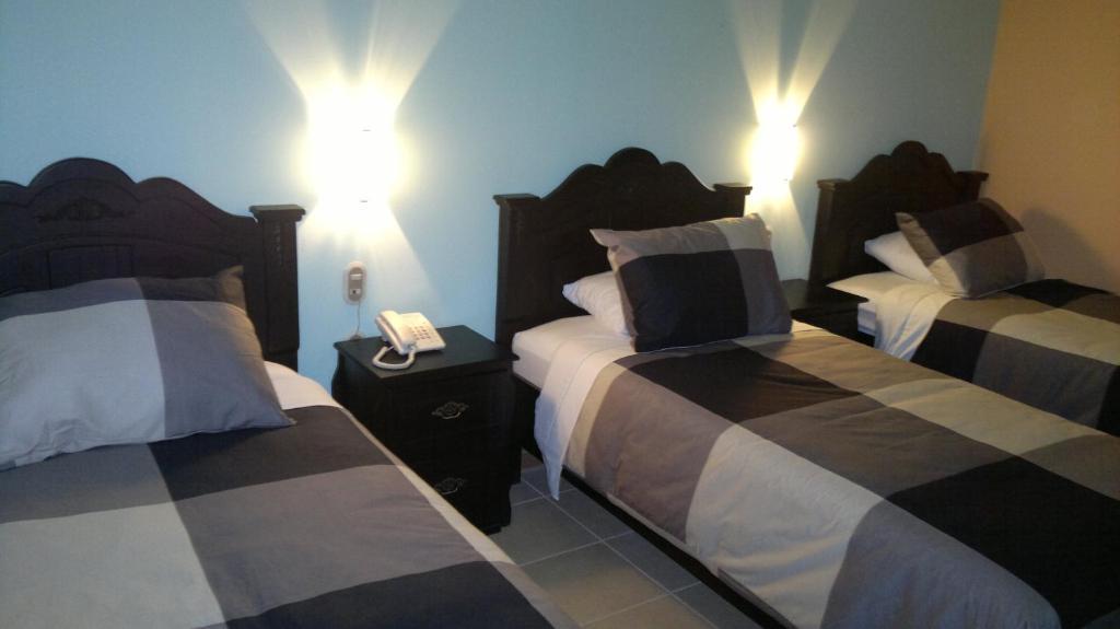 Hotel Eskalima Alajuela Quarto foto